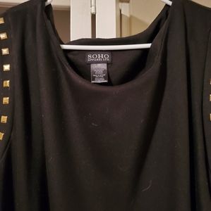 Black dress with cute gold studs.